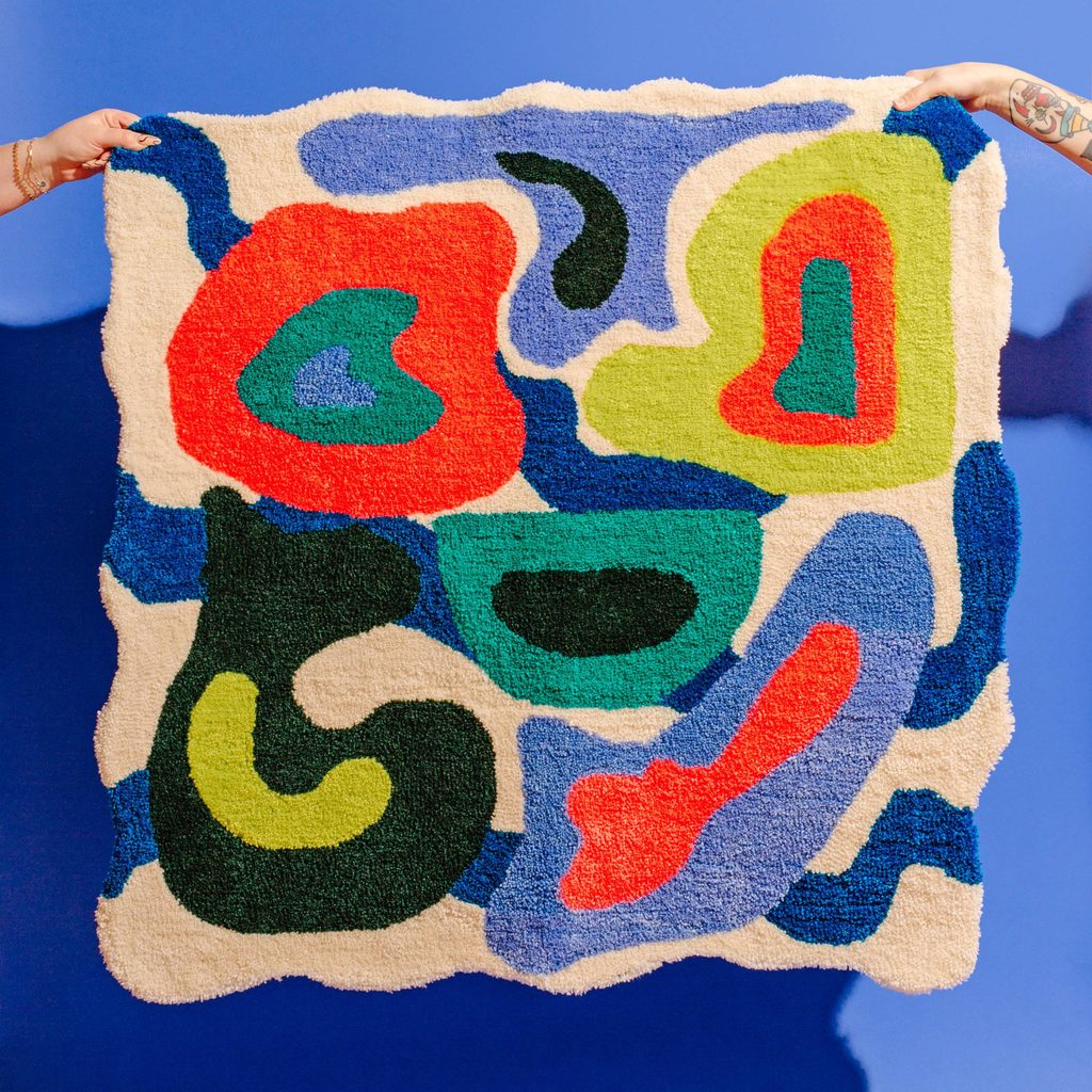 multi colored rug with different shapes